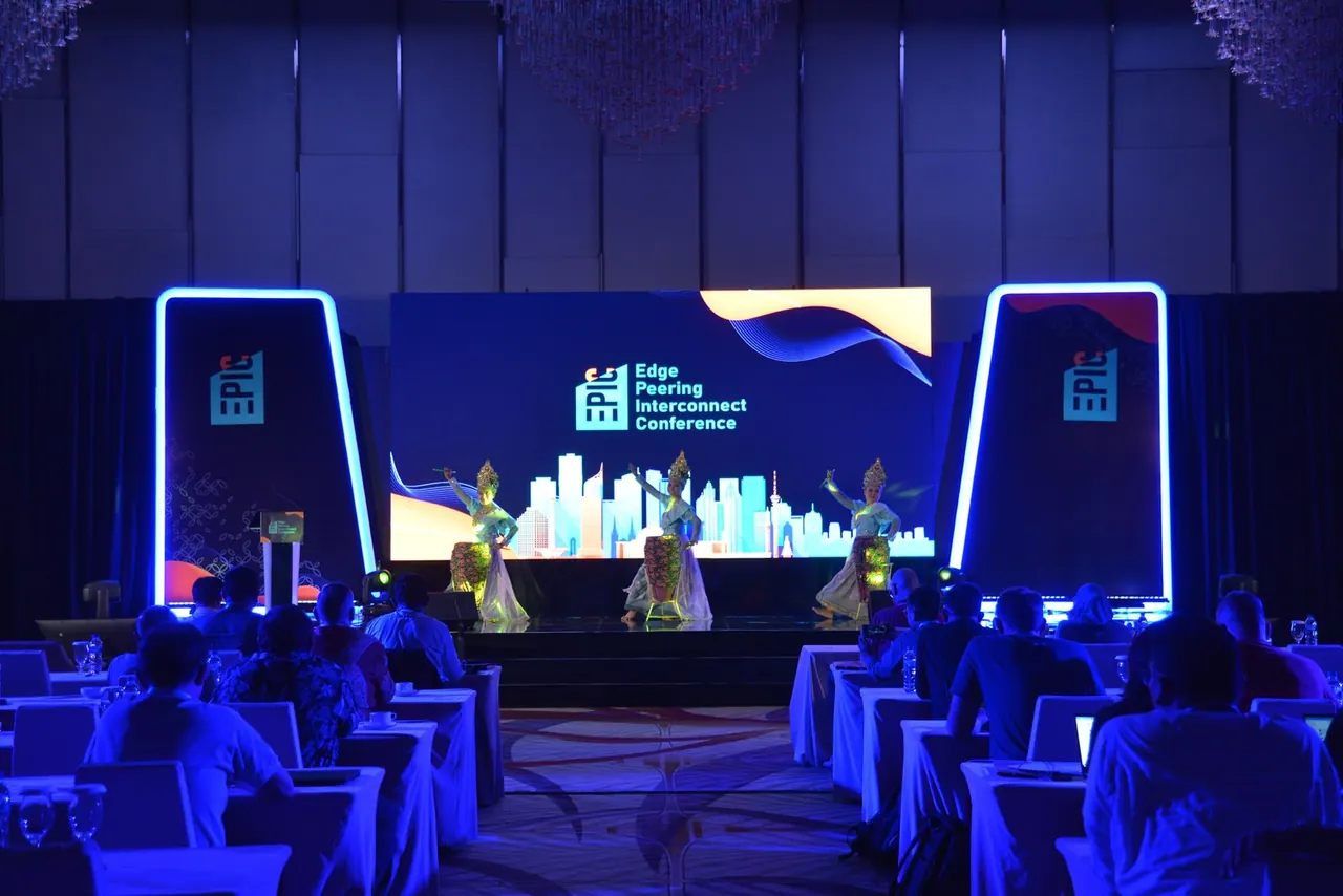 Edge Peering Interconnect Conference (EPIC) stage with traditional dancers